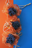 Μπομπονιέρα γάμου συνδυασμός πορτοκαλί και τυρκουάζ χρώματος