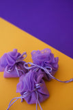 Πουγκί στρογγυλό ψαθάκι οργάντζα μινιατούρα σε λιλά χρώμα για γάμο