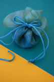 Πουγκί στρογγυλό ψαθάκι οργάντζα μινιατούρα σε τυρκουάζ χρώμα για γάμο