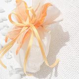 Μπομπονιέρα γάμου ιβουάρ πουγκί γάζας με πορτοκαλί πεταλούδα και σατέν φιογκάκι